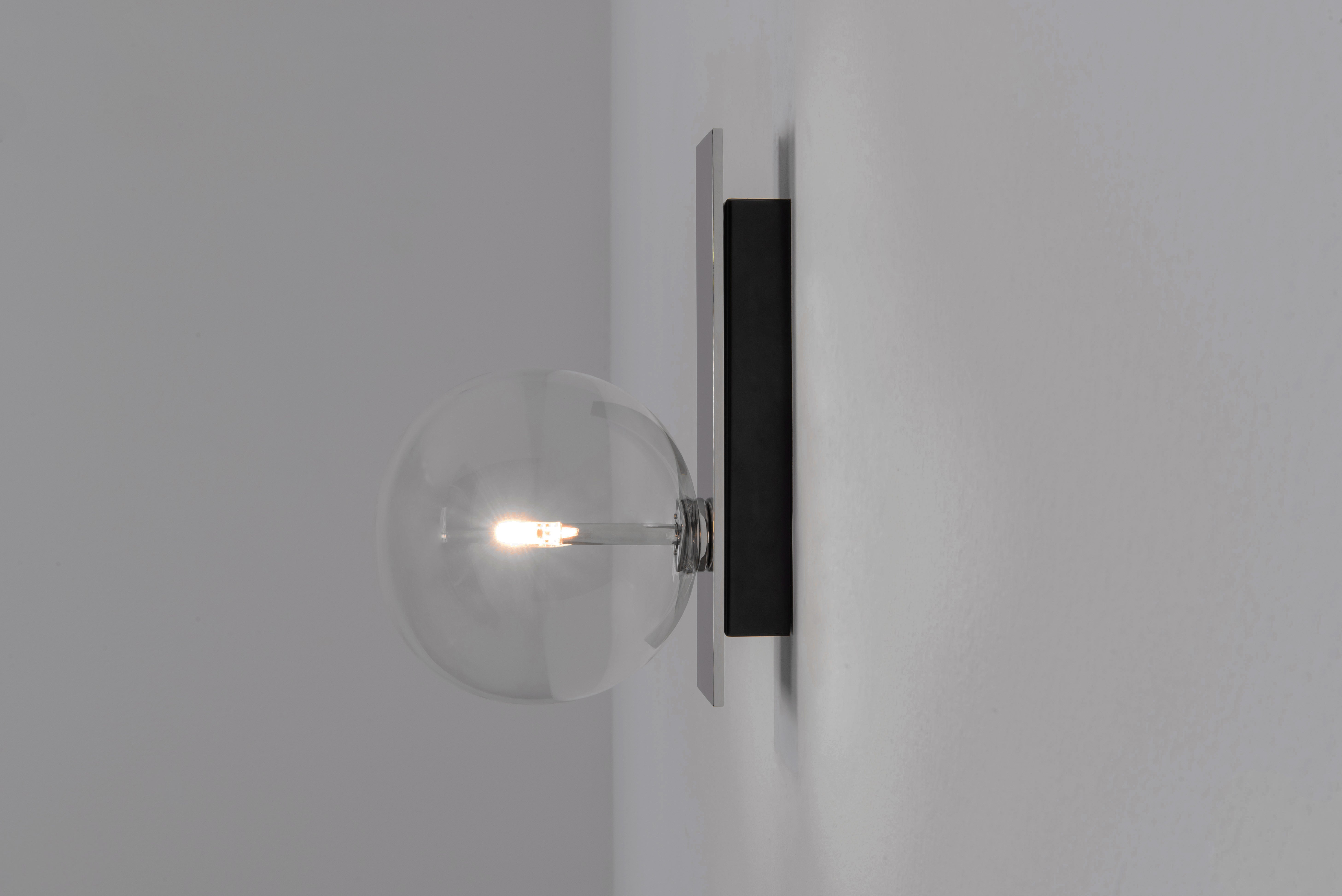 Schwung Oslo Single Polished Nickel Transparent Globe Wall Light